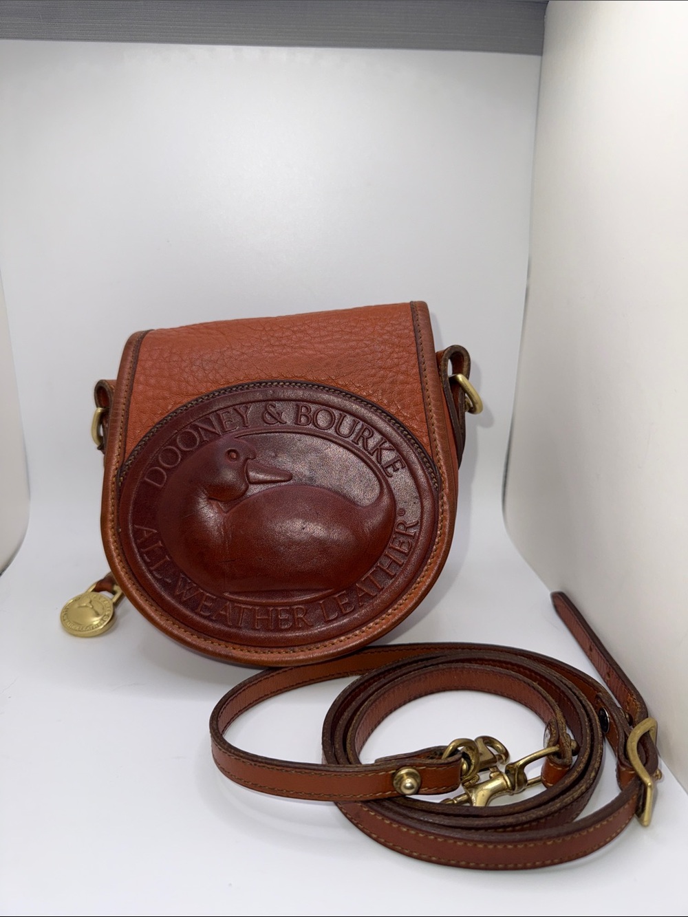 Vintage Dooney and Bourke Small All-Weather Brown Leather Duck Bag 150